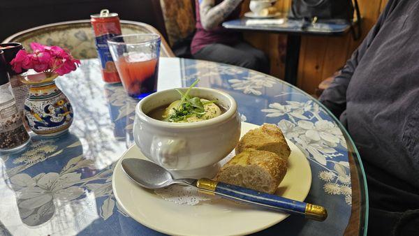 French onion soup with baguette pieces