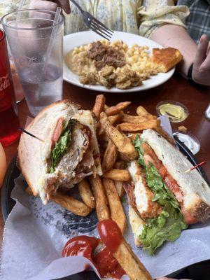 Mac and cheese with pulled pork, ale battered chicken sandwich with house fries