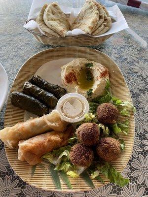 Appetizer sampler - hummus, Grape Leaves, Stuffed Cabbage Roll, Falafel (swapped out Baba Ghanouj for cabbage rolls)