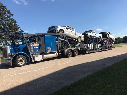 Shipping trucks from one oil field to another