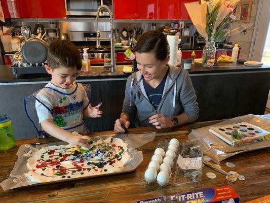 Nanny and child doing art activity