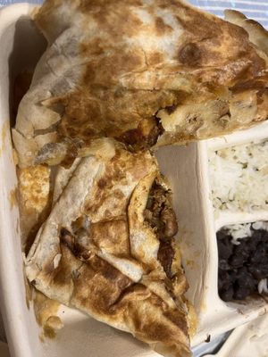 "Chicken quesadilla" Picture doesn't do it justice. Literally looks like it was cooked hours ago, left out and then stepped on.