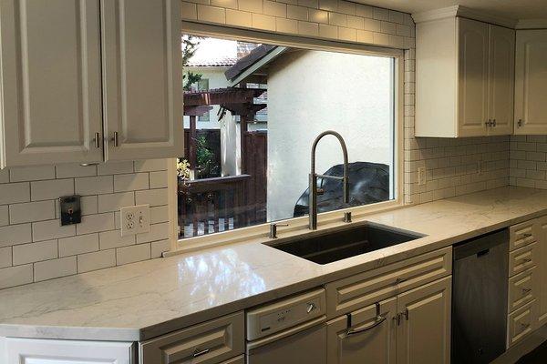 White Quartz with White Subway Tile Backsplash