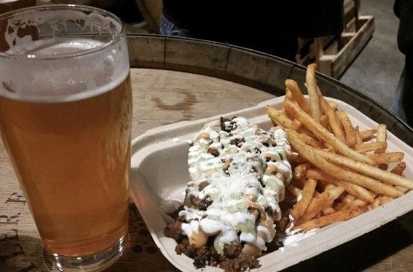 loaded hot dog and fries at Alvarado Street Brewery in Salinas