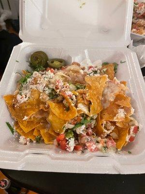 Soggy, wet, mushy nachos. Extremely salt dumped toppings!