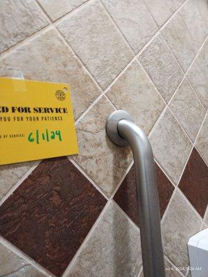 The Handicap shower. Just like the elevator, they don't care how long it takes to fix. Today is July 4th. Observe the date posted!