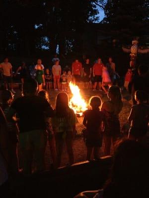 Weekly campfires bring families together at camp.