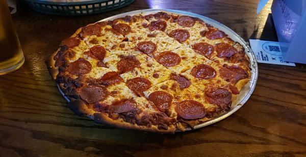 Pepperoni pizza cooked well done