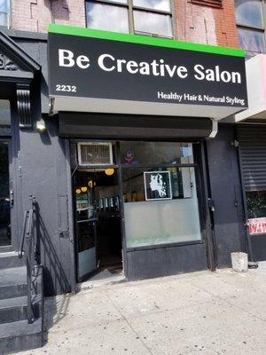 Salon entrance with awning.