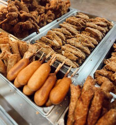 Potato wedges, Bone in chicken, Corn dogs & Santa Fe egg rolls.