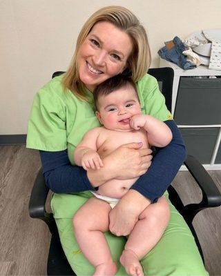 Happy baby with a belly full of mama's milk. (Shared with permission)