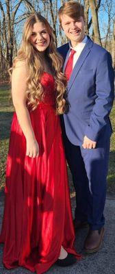 Simply stunning in a simple red satin dress.