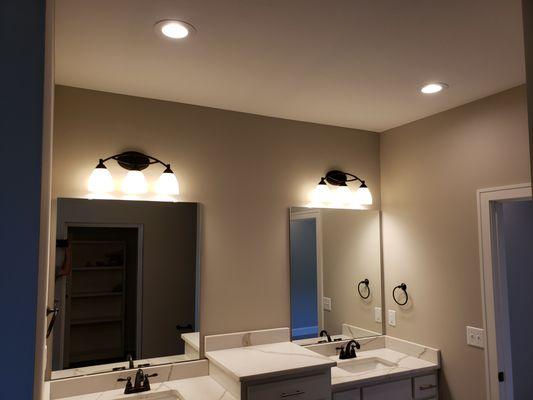 You cant overlook the importance of vanity lighting in bathrooms as well as overhead lighting.