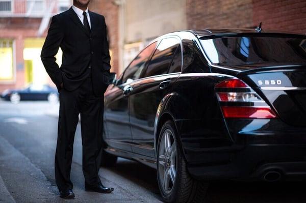 Your chauffeur waits to open the door for you! You deserve that special treat when you reserve with STS Limousine!