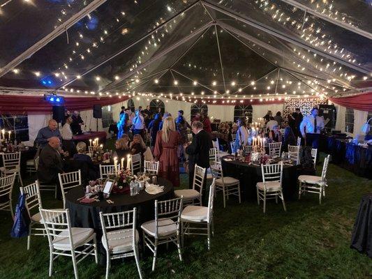 Wedding reception under a clear top tent