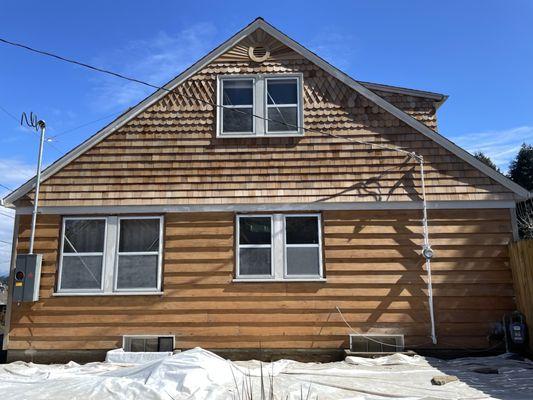 Full lead based paint remediation, install of custom shingles on top with sunburst.