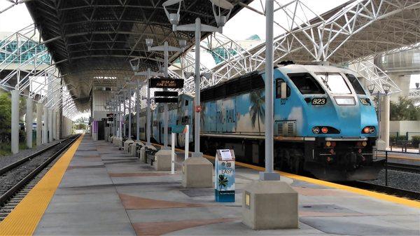 This is the locomotive of my imposing looking Tri-Rail train at the Miami Airport Station.  Metrorail (elevated rapid transit) is upstairs.