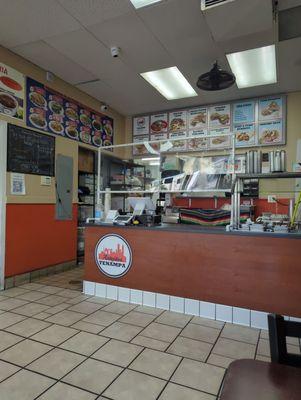 Front counter with salsa bar on the right.