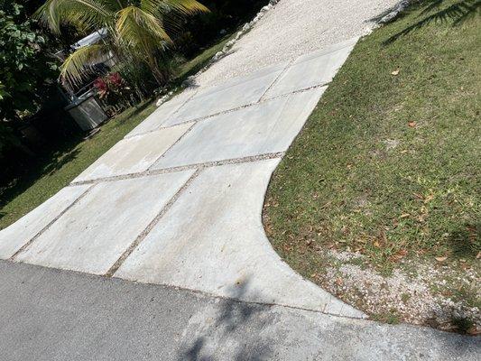 Entrance 2: The defaced middle one and the three pieces next to the street were the new concrete truck pour.