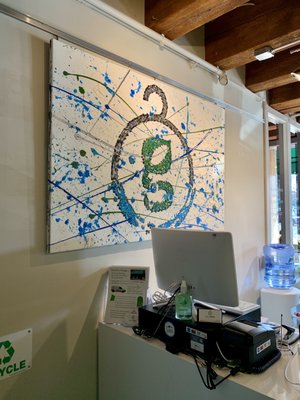 Local Boston artist, Giovanni DeCunto's painting of Green Organic's logo.