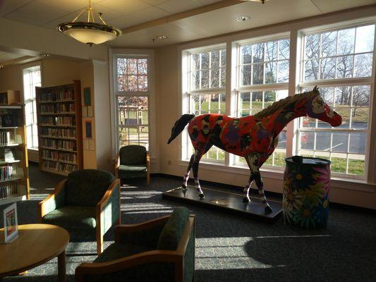 Photo of magazine and newspaper reading are at the Clark Co. Public Library.