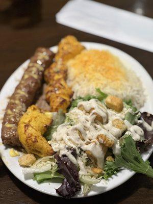 Chicken kabob and beef lule kabob plate with rice and Cesar salad