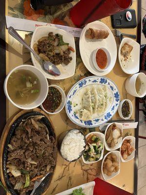 So much food... ordered the spicy bulgogi beef, steamed dumplings and egg rolls. They brought us all these different sides.