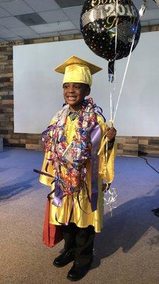 My son graduating from Good Stewart Preschool.