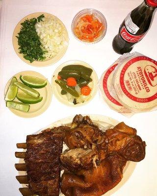 Carnitas by the pound and some hot peppers on the side can't forget Mexican coke ! Mmm