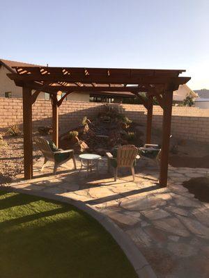 The pergola by the fountain.