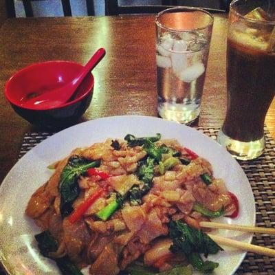 Pad See Ew with Chicken, Miso Soup, and Thai Iced Coffee