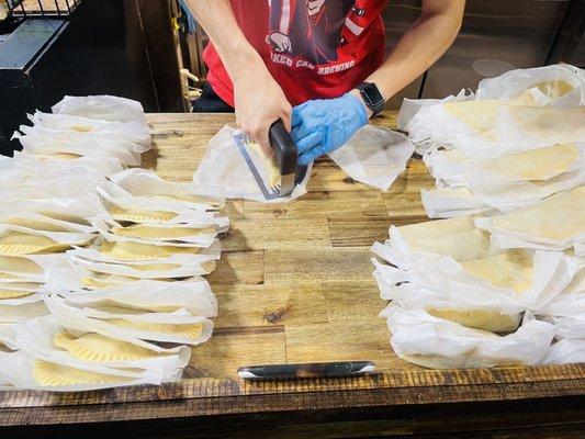 He had this nifty little gadget to crimp the edges to seal the empanada