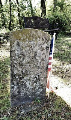 This Tombstone is basically impossible to read on the photo, but may be discernible in person.