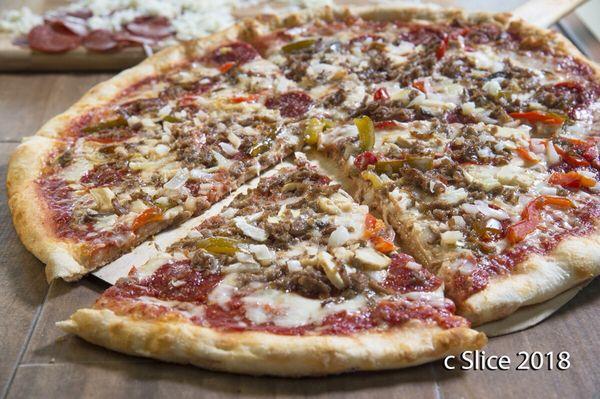 Guinto's Special is everything you want on a pizza. It has cheese, Sauce, Sausage, Pepperoni, Mushroom, Sweet Pepper, and Onion.