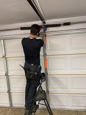 Repairing the garage door spring