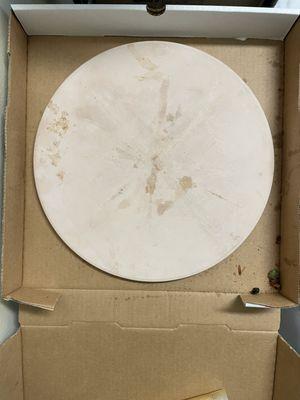 My 13" pizza stone in their 14" pizza box.