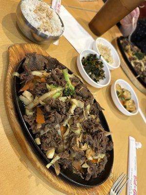 Beef bulgogi, rice (with soy sauce I added), and seaweed salad, bean sprouts, and marinated cucumbers.