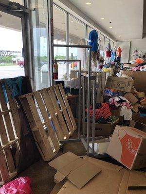 Huge hazard for anyone going in this store - front entrance of "clothing" side