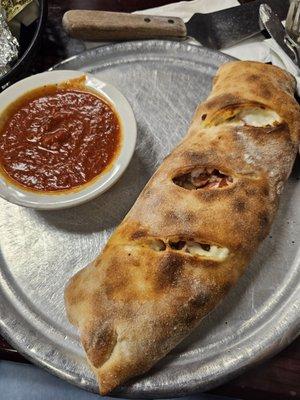 Stromboli!! It was delicious I would order it again