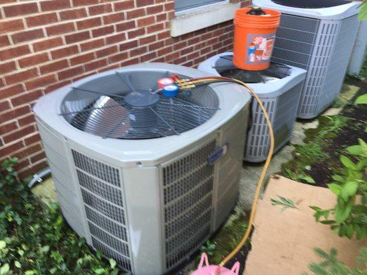 This new high efficiency outdoor ac condensing unit was installed to replace an old inefficient system in july