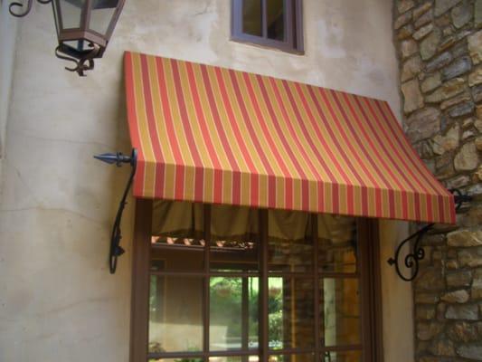 Retractable Awnings, Fixed Awnings, Drop Shades, and sunscreens