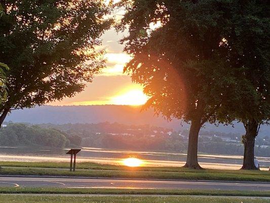 Take a glass of wine out to the Adirondacks and watch the sun on the river. The fireflies come out at dusk