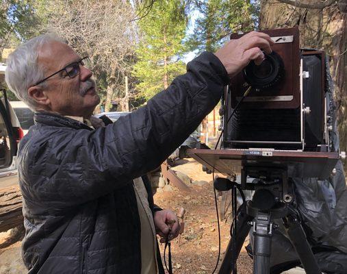 Bob Y, member, sets up his camera