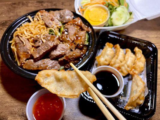 Pork Gyoza and steak teppanyaki over noodles