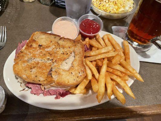 Reuben with a buttery crust and excellent fries.