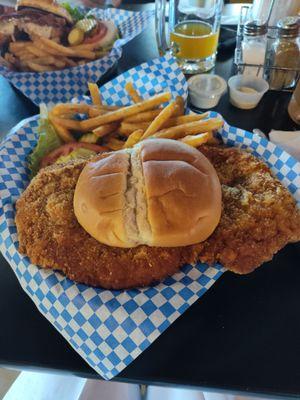 The breaded tenderloin was ginormous, the breading was perfect!  The fries have this seasoning....they are my favorite fries to date!