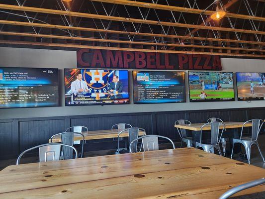 The dining area & some of the many TVs