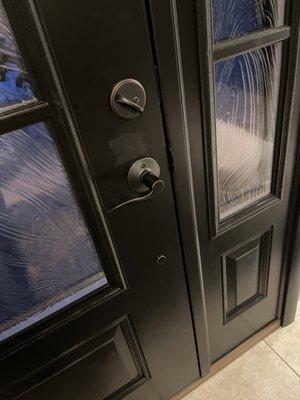 Scratched $6000 door and hardware. Installers covered with paint. Still waiting for a brand new door.