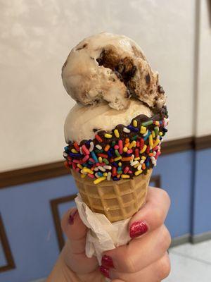 Mackinac Turtle Fudge on a rainbow sprinkles cone