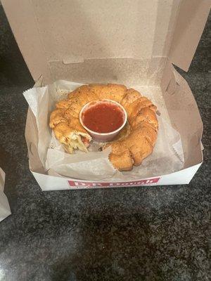 The Roni Rolls are cheese filled, not just breadsticks. Also very good and come with marinara so you dont need to order extra